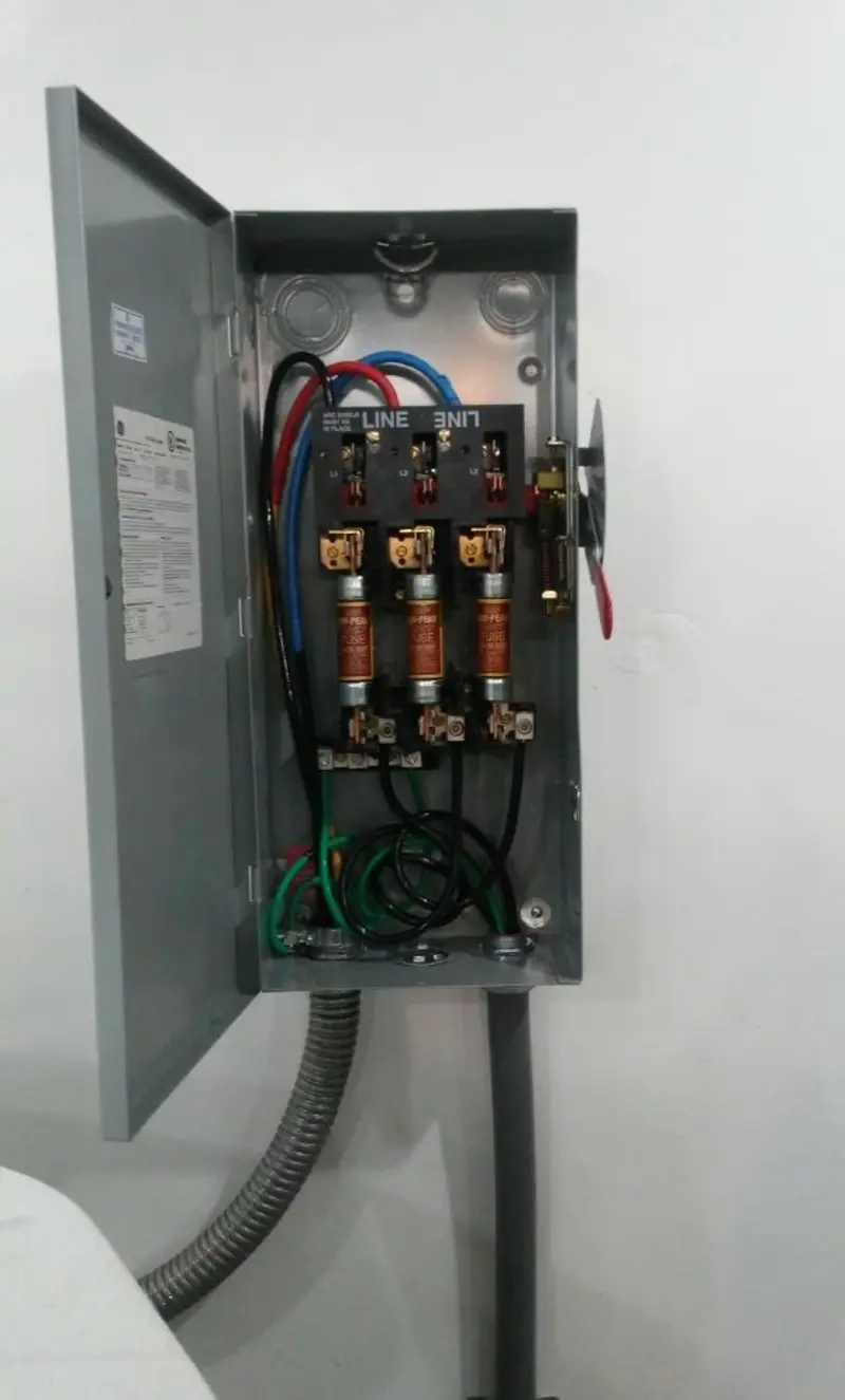 Three-phase disconnect switch installed for Smoke Detector Installation in Durand