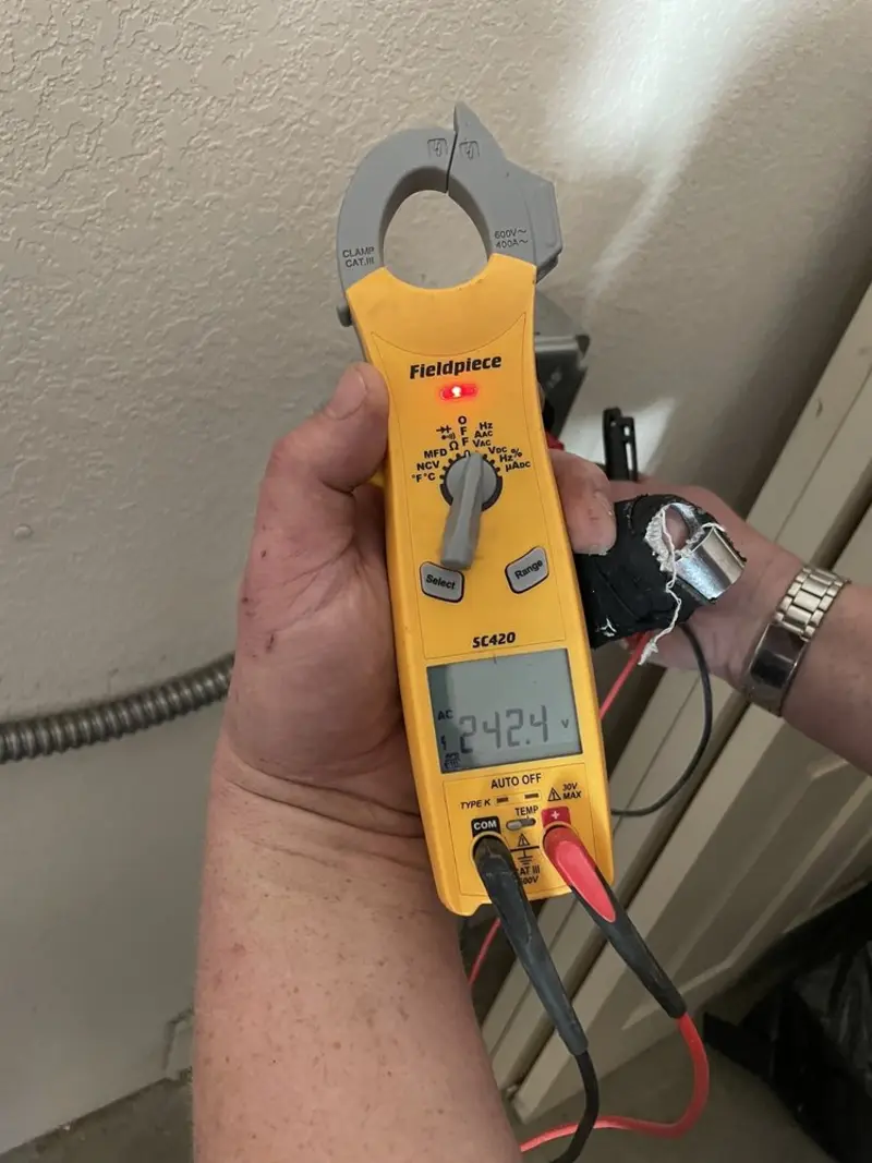Voltage testing with clamp meter during Aluminum Wiring Replacement in Durand